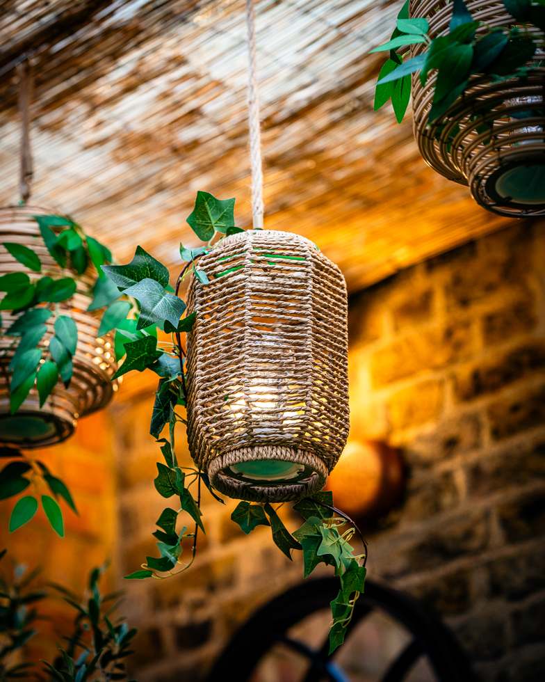 Rattan lantern hanging on the terrace