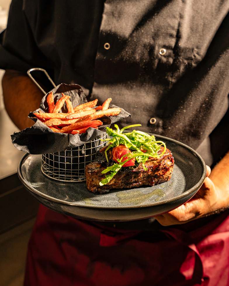 Sirloin steak served with fries